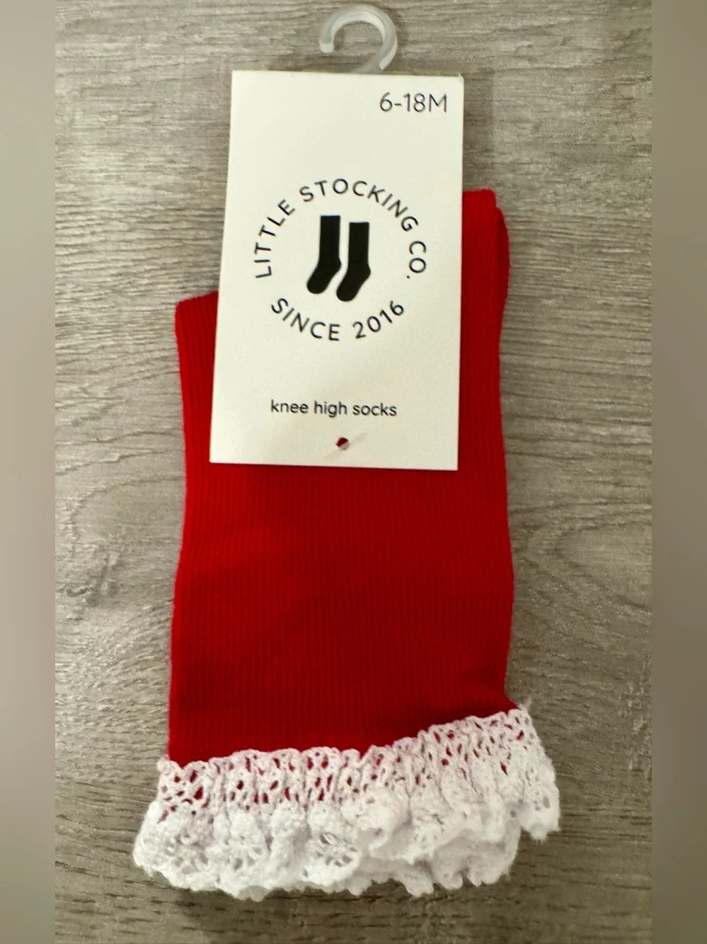 Little Stocking Co. — Red knee-high socks with lace trim at the top. Size:6-18 m